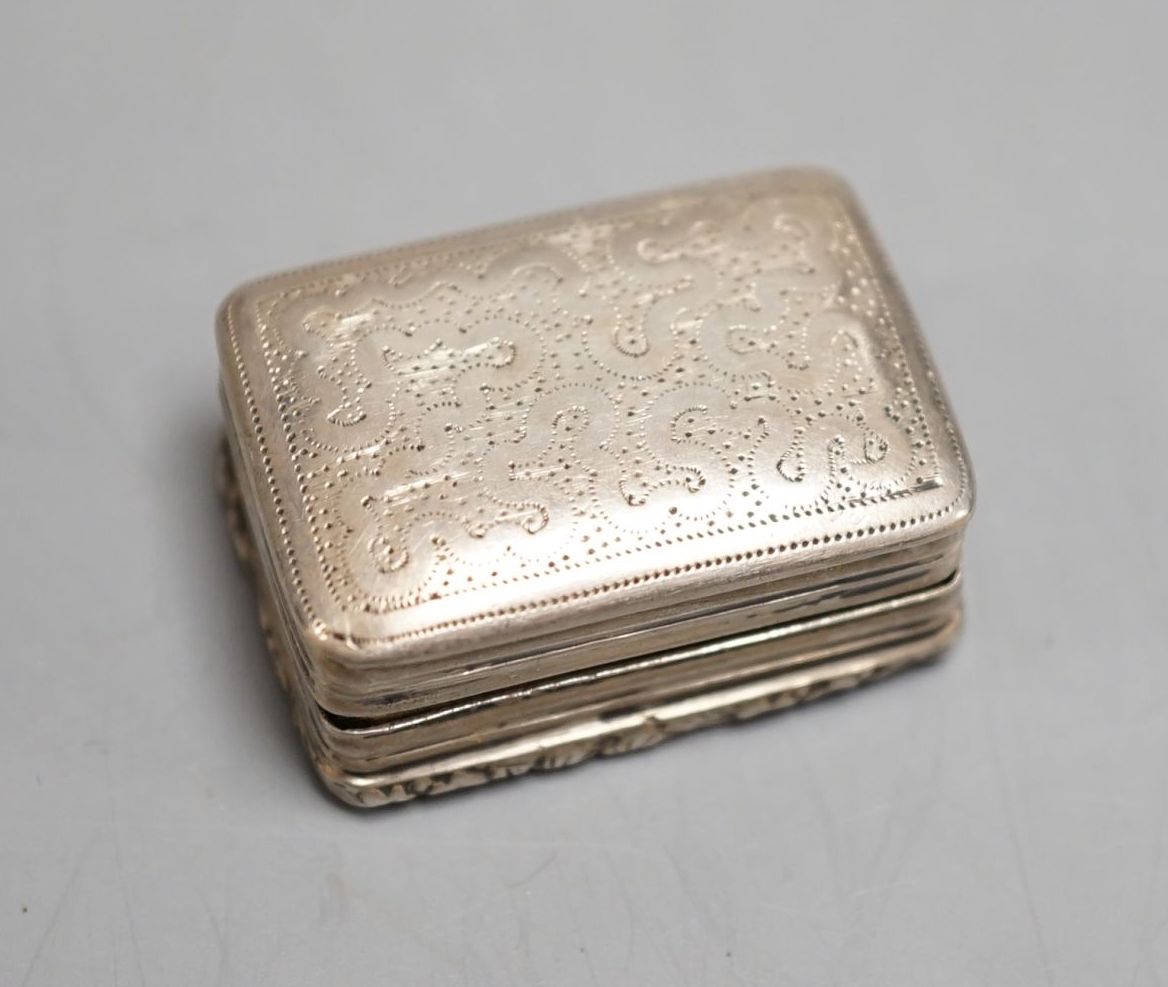 A George IV engraved silver rectangular vinaigrette, Thomas & William Simpson, Birmingham, 1824, 29mm.